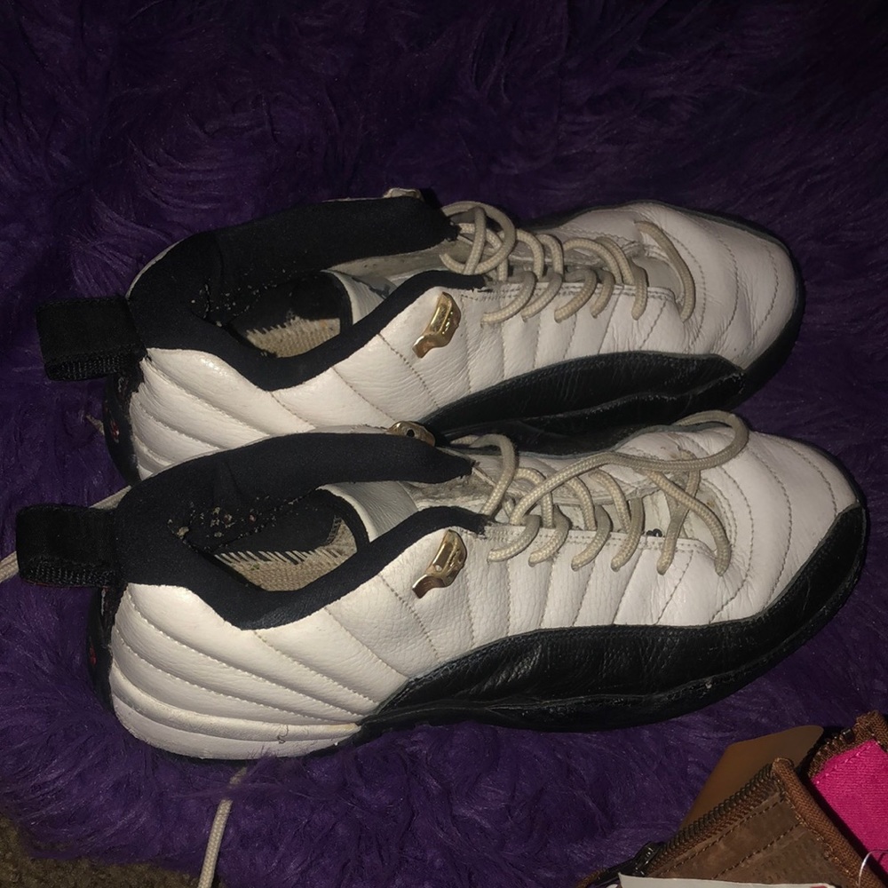 Used Jordans . Still in wearable condition . Still have soles intact.